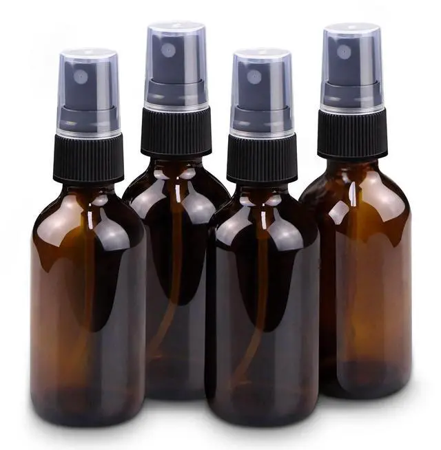 Main image of 2 oz Mini Glass Spray Bottles, Empty Small Spray Bottles with Funnel Dropper, Fine Mist for Hair, Travel, Plants, Cleaning Solutions and Skin Care (4 Pack Amber)