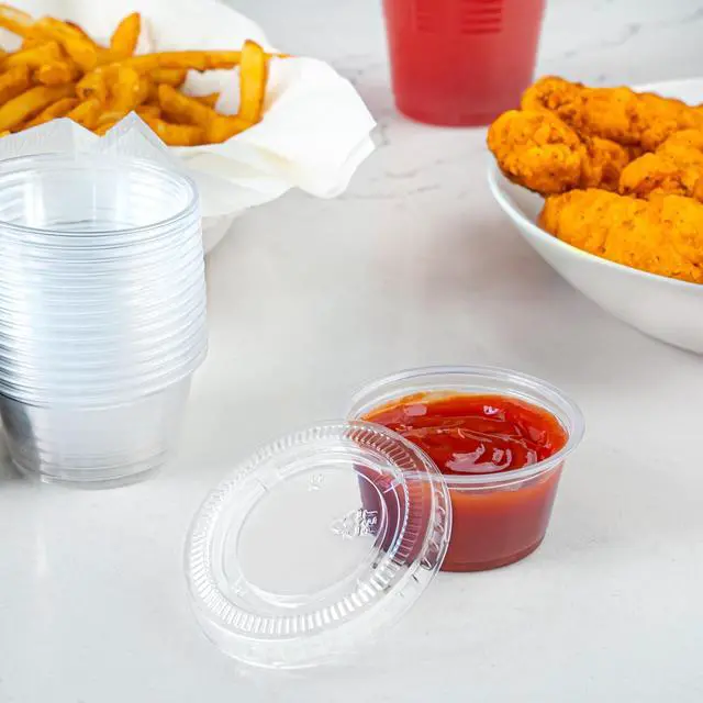 Alt view image 6 of 6 - Amazon Basics Disposable Plastic To-Go Cups and Lids, Mini, 2oz, 50 Count, BPA Free, for Condiment, Salad Dressing, Sauces, Jello Shots