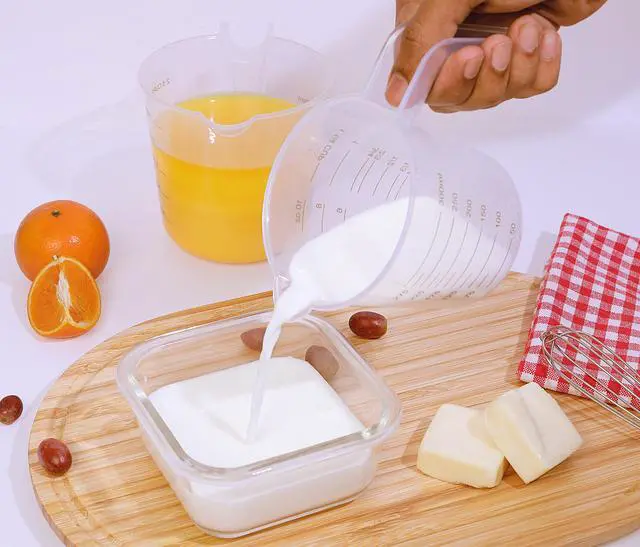 Alt view image 5 of 6 - Mainstays 3-Piece Plastic Nesting Measuring Cup Set with Tapered Spout and Easy-to-Read Markings
