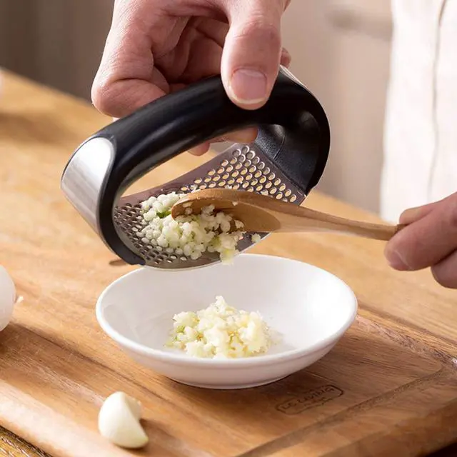 Alt view image 5 of 7 - Garlic Press Rocker Stainless Steel Ginger Crusher Squeezer Kitchen Gadget with Ergonomic handle, Silicone Tube Garlic Peeler and Cleaning Brush Tool Set
