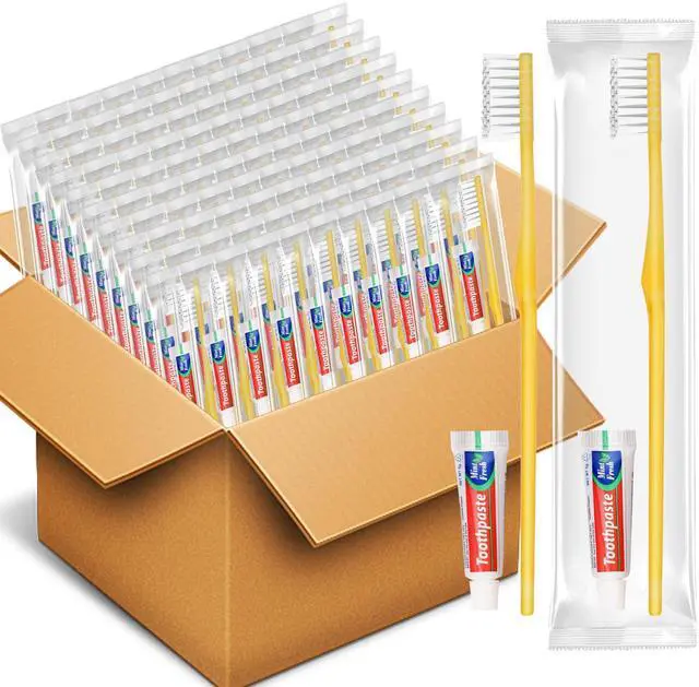 Main image of Disposable Toothbrushes with Toothpaste Pack of 30, Yellow Hollow Travel Toothbrush Set with 5g Bulk Toothpaste Individually Wrapped for Homeless, Nursing Home, Shelter, Hotel
