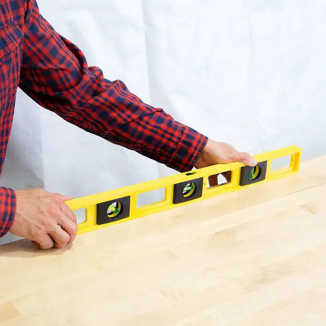 Alt view image 6 of 7 - 10101 2 Ft Level, 24 Inch Level Made in USA, Wont Scratch Surfaces | High-Impact Polystyrene Frame, 3 High-Visibility Vials, 1/8" and 1/16" Graduations, Ruled Edge for Accurate Measuring