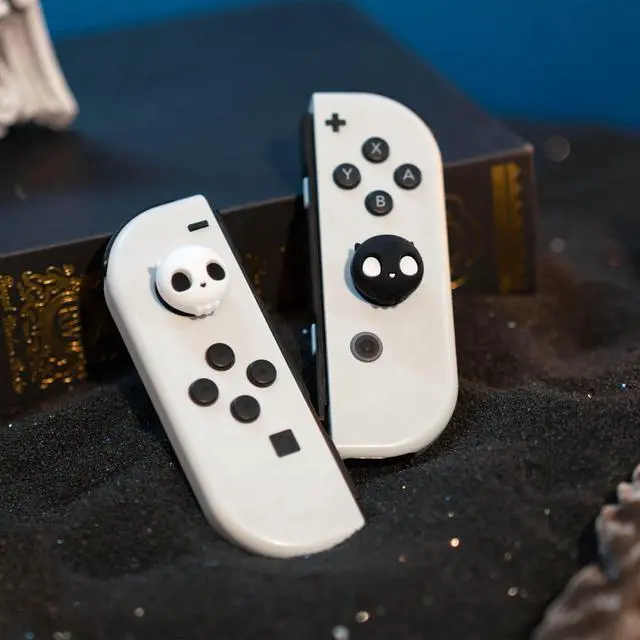 Alt view image 5 of 7 - Cute Silicone Joycon Thumb Grip Caps, Joystick Cover Compatible with Nintendo Switch / OLED / Switch Lite,4PCS -- Skull (Black & White)