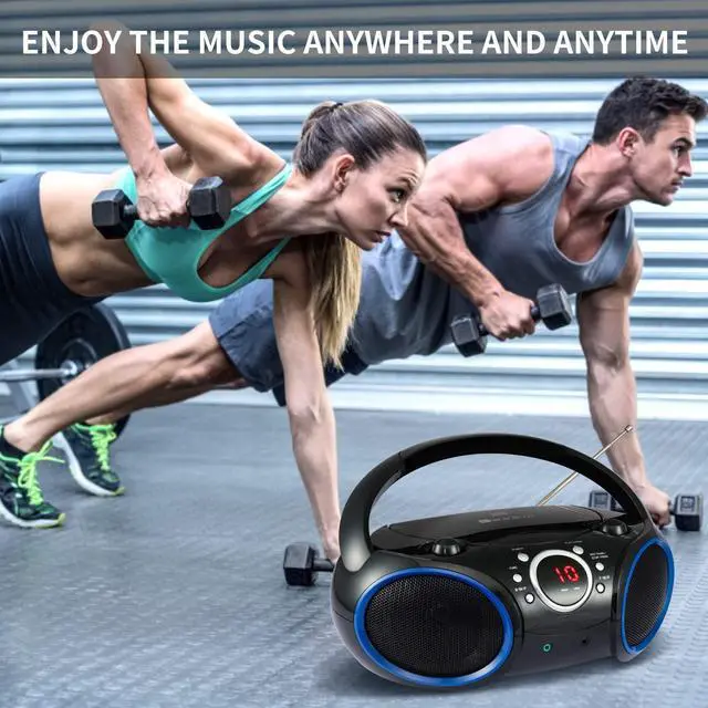 Alt view image 12 of 14 - SBX030C Portable CD Player Boombox with AM/FM Stereo Radio, Aux Line-in, Headphone Jack, Top-Loading Disc Player, AC or Battery Powered, Foldable Handle (Black with Blue Rims)