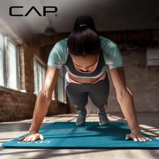 Alt view image 6 of 7 - 1/2" Thick Yoga Mat, Exercise & Workout Mat with Strap, Teal | Latex-free NBR foam cushions knees and joints for Pilates, stretching, core training, floor exercises and home fitness.