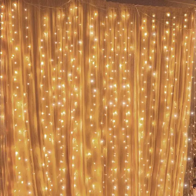 Main image of 300 LED Curtain String Lights, Warm White | 8 Modes, Plug In, For Bedroom Wedding Party Birthday, Indoor Outdoor Wall Window Backdrop