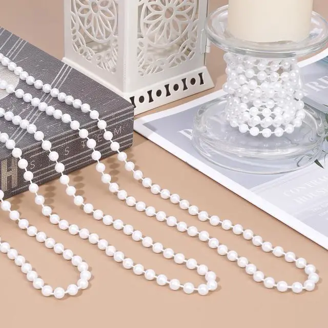 Alt view image 4 of 7 - 12 Pcs Faux Pearl Necklaces Bulk, Long White 1920s Party Costume Jewelry | White Faux Pearl Necklaces for Flapper Costumes, Great Gatsby Parties, Weddings, Bridal Showers and Tea Parties, 33in