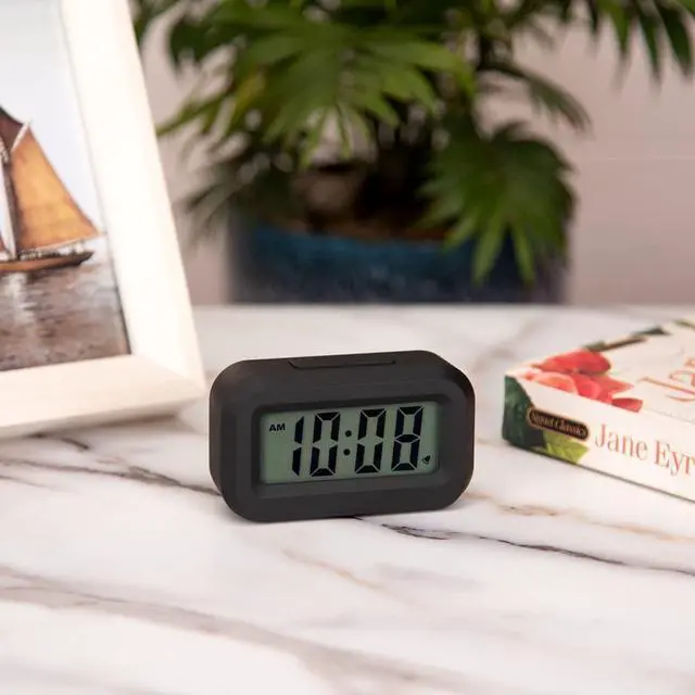 Alt view image 6 of 6 - Small Digital Travel Alarm Clock,Simple Operation,Easy to Read,Ascending Alarm,12/24Hr,Snooze Soft Light for Bedside,AAA Battery Operated,Black