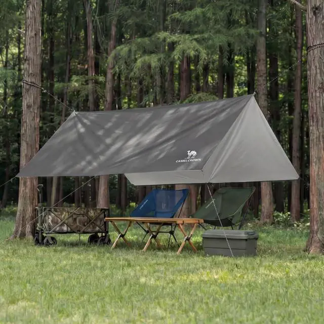Alt view image 2 of 7 - Camping Tarp,3000mm Waterproof & UPF 50+ Sun Protection Rain Fly Tarp - Lightweight Portable Camping Shelter with Stakes, Guy Lines & Carry Bag, for Hiking Backpacking Beach Picnic Shade