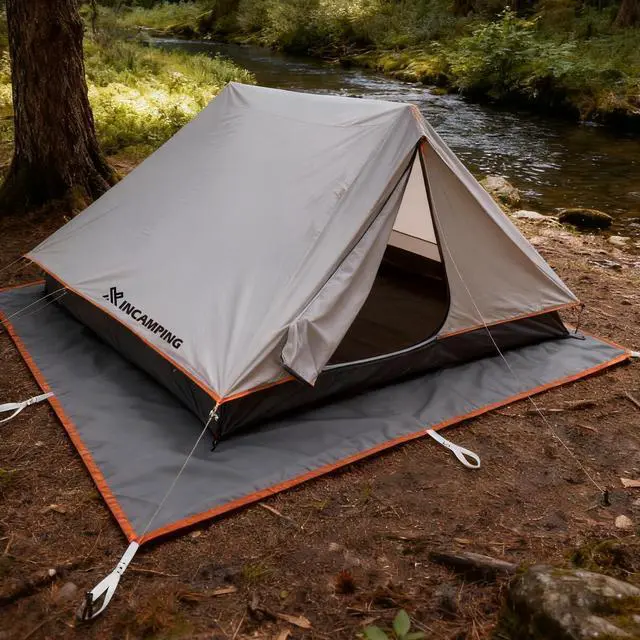 Alt view image 5 of 7 - Tent Footprint - 57" X 82.6" Heavy Duty Camping Tarp with 8 Anchor Straps - Waterproof Tent Floor Mat,Ultralight Backpacking Tarp for Camping,Hiking,Beach,Picnic - Storage Bag Included