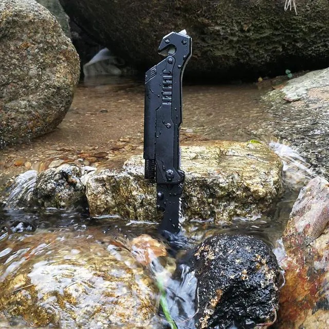 Alt view image 4 of 7 - 6-in-1 Survival Tactical Military Folding Pocket Knives with LED Light,Seatbelt Cutter,Glass Breaker,Magnesium Fire Starter,Bottle Opener;Multi-Function Emergency Tool(Black)