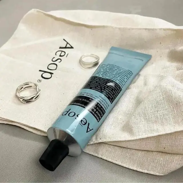 Alt view image 4 of 7 - Reverence Aromatique Travel Size Hand Balm | Lotion that Gently Exfoliates Dry Hands + Nourishes with Macadamia Seed Oil and Shea Butter | 2.4 oz / 75 mL