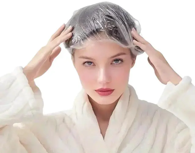 Main image of 200PCS Disposable Shower Caps, Plastic Clear Hair Cap Large Thick Waterproof Bath Caps for Women & Men Unisex Reusable Travel Essentials for Deep Conditioning, Hair Treatment, Hotel, Spa, and Home Use