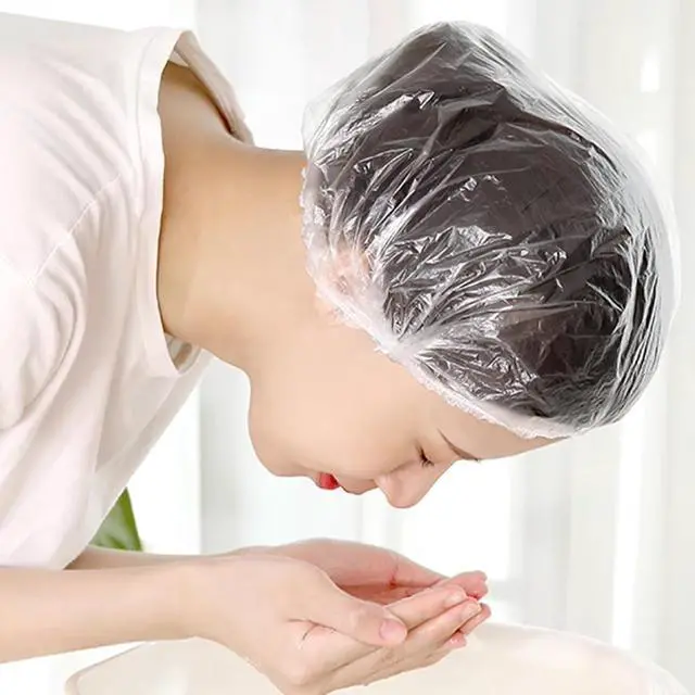 Alt view image 3 of 5 - 200PCS Disposable Shower Caps Bulk 16" Plastic Clear Hair Cap Elastic Waterproof Bath Caps for Women Hair Care Cleaning Supplies Spa Hotel and Hair Salon Home Use Travel Accessories