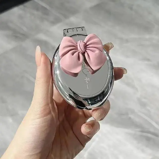 Alt view image 4 of 5 - Small Makeup Mirror with Folding Comb, Portable Mirror, Suitable for Women and Girls, Perfect for Handbags, Portable Bags, Touch-ups, Daily use, and Travel Essentials (Pink Bow)