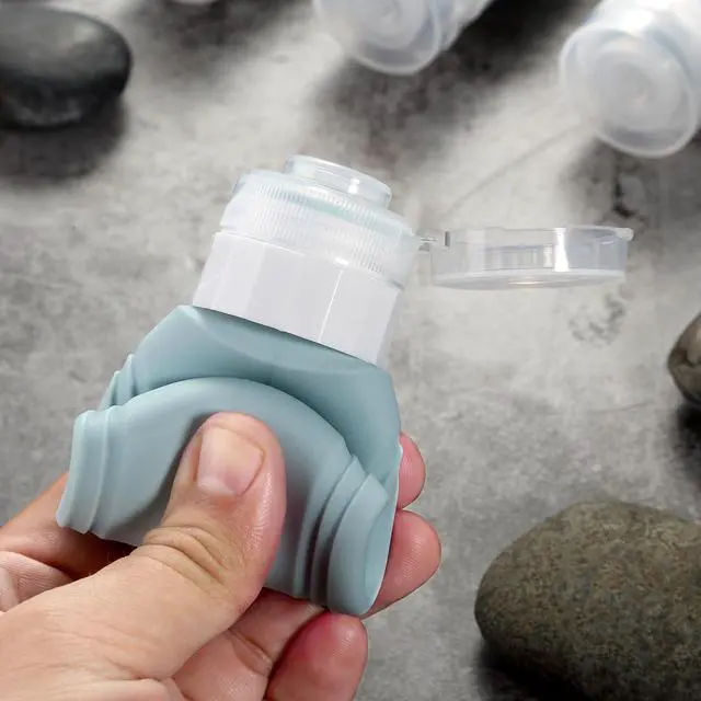 Alt view image 7 of 7 - Travel Bottles for Toiletries, Tsa Approved 3oz Travel Size Containers BPA Free Leak Proof Refillable Liquid Silicone Squeezable Travel Accessories for Shampoo Conditioner Lotion (4 Pack)