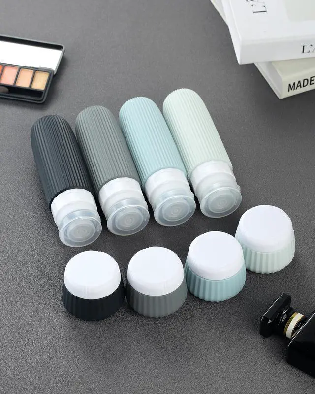 Alt view image 4 of 6 - Travel Bottles - 8 Pack, TSA Approved Travel Size Toiletries, Leak Proof Silicone Squeezable Containers in Clear Bag