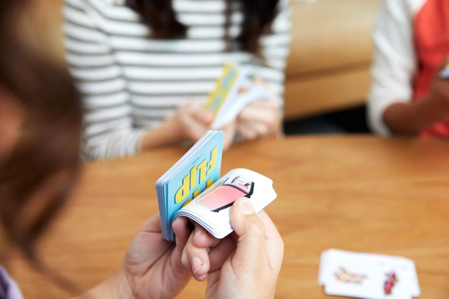 Alt view image 2 of 6 - Mattel Games PIC FLIP Card Matching Game with 110 Cards in a Decorative Tin, Makes a Great Game for 7 Year Olds and Up