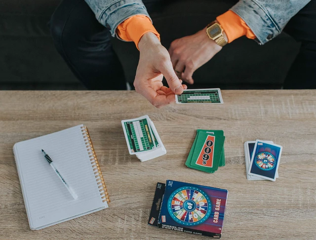 Alt view image 2 of 2 - Wheel of Fortune Card Game - Faced Paced Competition - Travel Sized Party Game