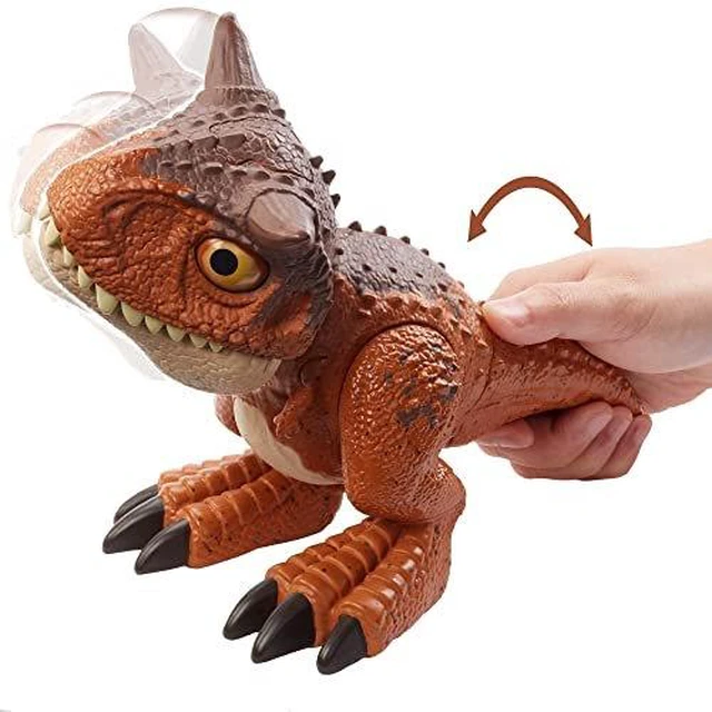 Alt view image 6 of 7 - Jurassic World Toys Chompin Carnotaurus Toro Dinosaur Action Figure Camp Cretaceous with Button-Activated Chomping & Other Motions, Realistic Sculpting, Kid Gift Age 4 Years & Up, Multi