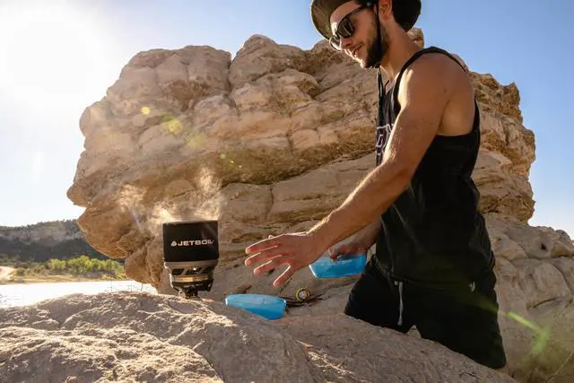 Alt view image 2 of 7 - Jetboil MiniMo Camping and Backpacking Stove Cooking System with Adjustable Heat Control (Carbon)