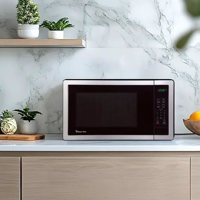 Alt view image 4 of 5 - 1.1 cu. ft. Countertop Microwave in Stainless Steel with Digital Touch