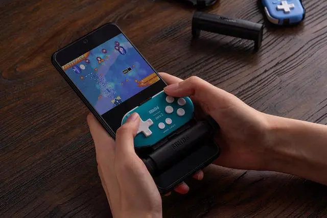 Alt view image 6 of 7 - Zero 2 Bluetooth Gamepad Keychain Sized Mini Controller with Mobile Clip for Switch, Windows, Android (Yellow Edition)