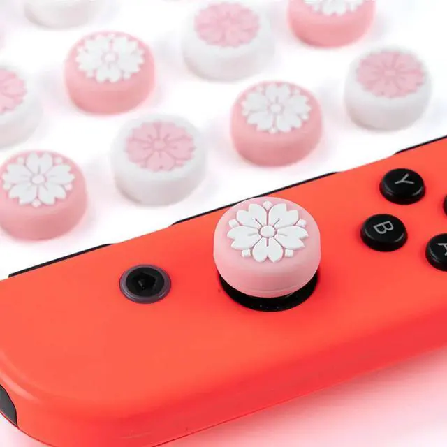 Main image of 4 Pack Sakura Flower Thumb Grip Caps, Soft Silicone Cover Joystick Cap For Switch & Lite