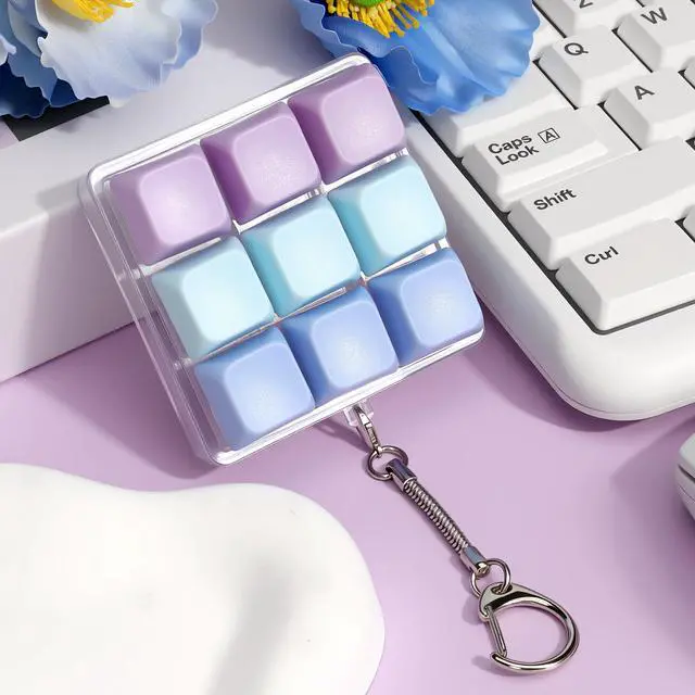 Alt view image 3 of 7 - Keyboard Fidget Toy, 9-in- 1 Keyboard Keychain Push Bubble Sensory Fidget Toys, Anxiety and Stress Relief Gifts for Children Adults Friends (Purple and Blue)
