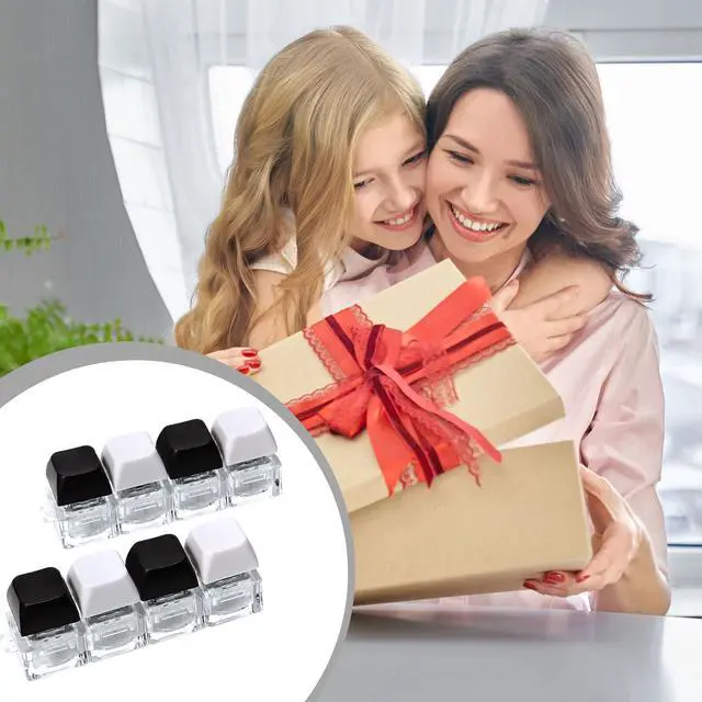 Alt view image 7 of 7 - 2 PCS Keyboard Fidget Toy, 4-in-1 Keyboard Button Clicker Keychain, Push Bubble Sensory Fidget Toys for Kids Adults to Relief Pass Time (Black White)