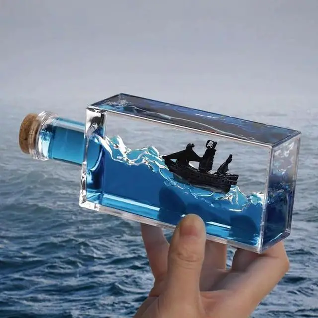 Main image of Unsinkable Black Pearl Pirate Ship in a Bottle - Ghost Ship in Ocean Wave Desk Decor for Home Office Decors, Unique Birthday Gifts for Men & Pirate Lovers, Liquid Motion Art Desktop Ornament (Black-e)