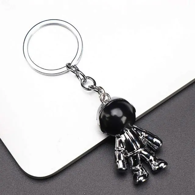 Alt view image 7 of 7 - Black Spacemen Keychains for Men Creative Astronaut Car Key Chain Pendant Backpack Purse Charm Lucky Astronaut Keyrings