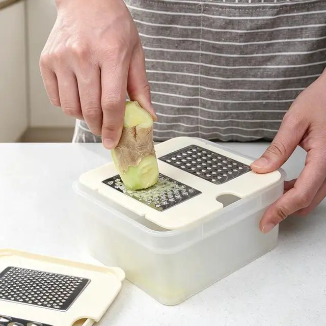 Alt view image 2 of 5 - Four-Blade Grater Box
PP and 430 stainless steel construction for grating and shredding vegetables, garlic, and ginger