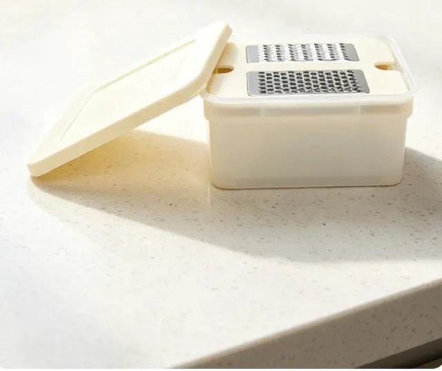 Alt view image 5 of 5 - Four-Blade Grater Box
PP and 430 stainless steel construction for grating and shredding vegetables, garlic, and ginger
