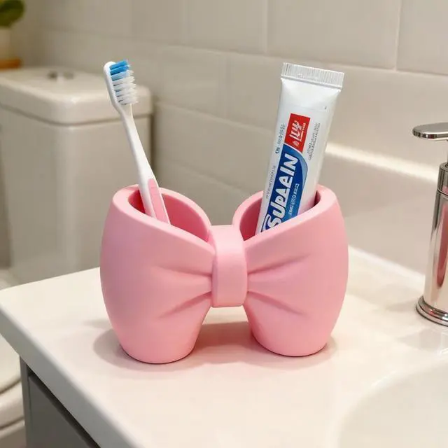 Alt view image 5 of 6 - Plastic Bow Toothbrush Holder, 2-in-1 Countertop Pen Organizer, Nonslip Bathroom Accessory for Electric Toothbrush, Space-Saving Desk Decor for Home Office Dorm (Pink) White