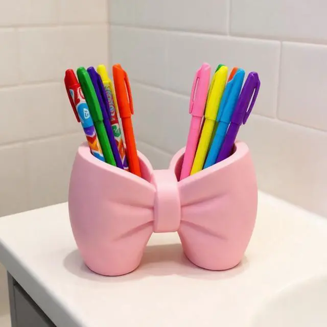 Alt view image 2 of 6 - Plastic Bow Toothbrush Holder, 2-in-1 Countertop Pen Organizer, Nonslip Bathroom Accessory for Electric Toothbrush, Space-Saving Desk Decor for Home Office Dorm (Pink) White
