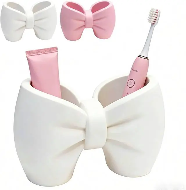 Main image of Plastic Bow Toothbrush Holder, 2-in-1 Countertop Pen Organizer, Nonslip Bathroom Accessory for Electric Toothbrush, Space-Saving Desk Decor for Home Office Dorm (Pink) White