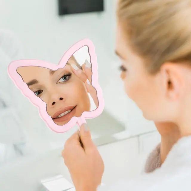 Alt view image 4 of 7 - Butterfly-Shaped Handheld Mirrors, Cosmetic Hand Mirror with Handle Small Butterflies Mirrors Decorative Hand Held Mirror for Student Women Girls Valentine's Day Travel Pink