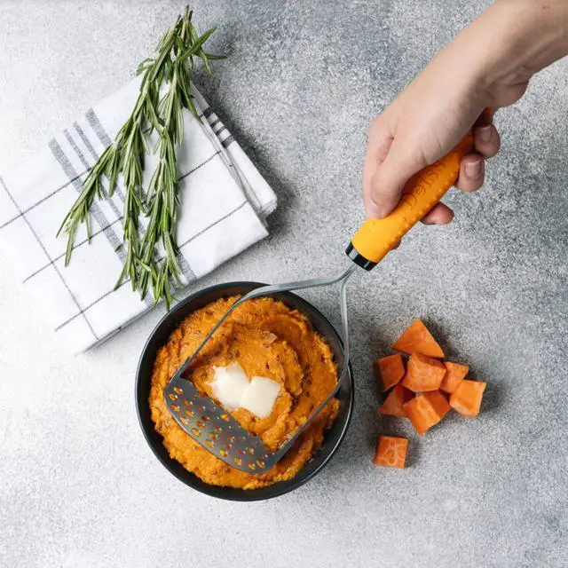 Alt view image 6 of 7 - PRO Heavy Duty Stainless Steel Potato Masher with Non-Slip Rubber Handle Hand Held Mash Maker for Struggle-Free Mashing Dishwasher Safe Vegetable and Fruit Masher