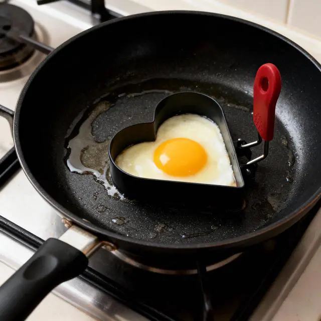 Alt view image 4 of 6 - 3.5" Heart Egg Cake Ring with Silicone Handle, Set of 2
