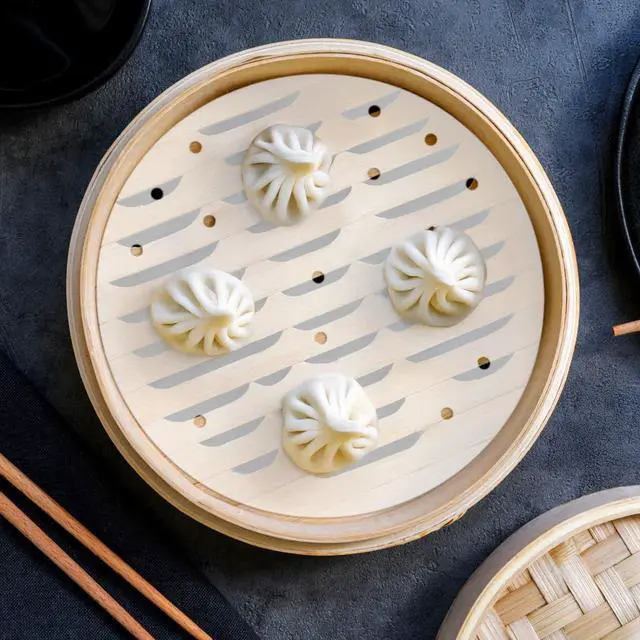 Alt view image 5 of 7 - 100 Pcs Bamboo Steamer Liner - 10" Round Steam Paper With Holes