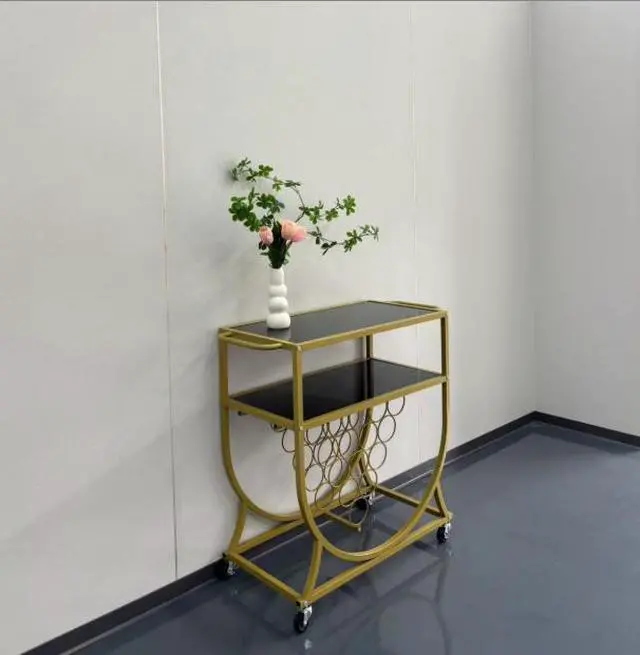 Alt view image 2 of 5 - The black and gold color combination of the dining cart trolley makes it extremely convenient for storage and organization.