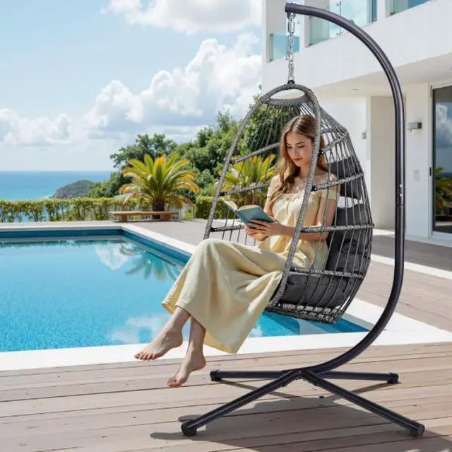 Alt view image 5 of 5 - Frame-supported woven egg-shaped hanging chair for courtyard or balcony, with thick soft cushion for comfortable sitting, suitable for home leisure use and with load-bearing capacity.