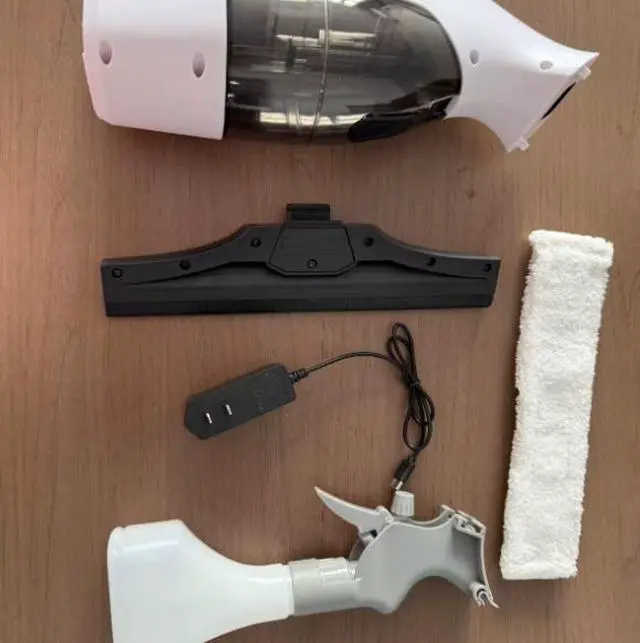Alt view image 5 of 5 - New model small electric window cleaning handheld device with strong suction, efficient absorption, powerful adhesive, and highly portable features.