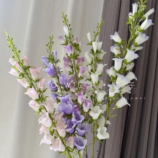 Alt view image 5 of 5 - Lily of The Valley Artificial Flowers,3Pcs 40" Bulk Fake Silk Bell Flowers Wind Chime Orchid with Long Stems,Large Faux Florals for Home, Garden, Wedding Decoration (Pinkish Purple)