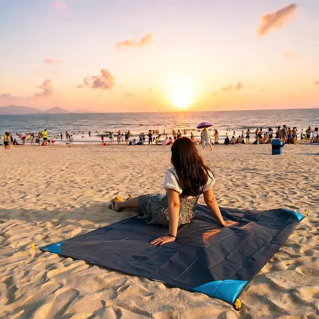 Alt view image 4 of 7 - Pocket Blanket 71"x55", Lightweight Compact Sandproof Waterproof Outdoor Blanket for Beach, Hiking, Camping, Travel, Festivals, Picnic with Pockets, Loops, Stakes, Carabiner