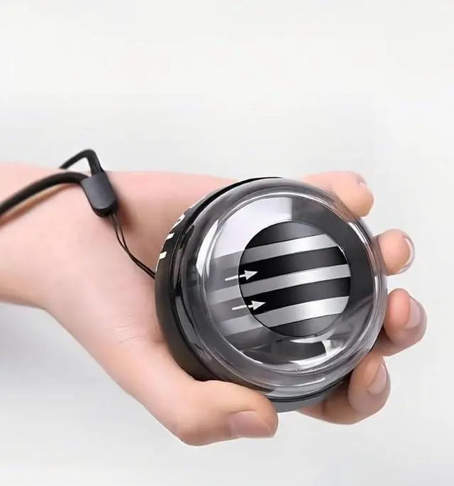 Alt view image 2 of 5 - Ball Wrist Trainer Auto Start Power Ball for Forearm, Grip & Hand Strength Gyroscopic Exerciser for Athletes, Musicians & Rehab