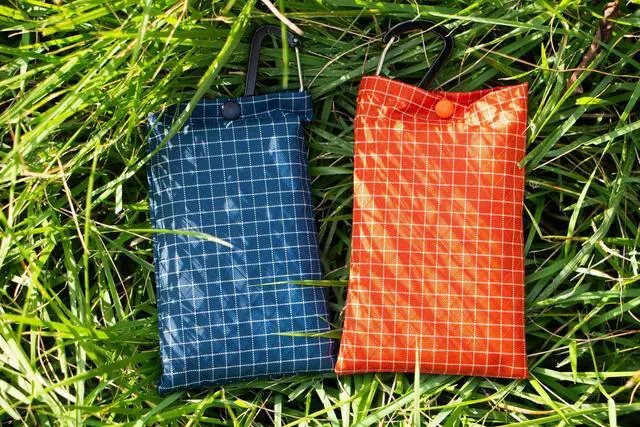 Alt view image 6 of 6 - Pocket Picnic Blanket - Waterproof, Lightweight, Compact & Sandproof | Portable Mat for Hiking, Camping, Backpacking, and Beach Trips | Fast-Drying Ground Cover - 13.8'' x 13.8''