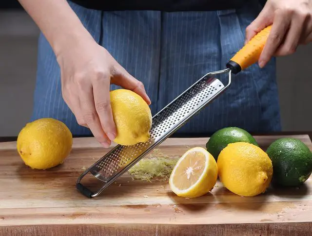 Alt view image 4 of 7 - PRO Lemon Zester & Heavy Duty Cheese Grater & Vegetable Grater - Parmesan Cheese Lemon, Garlic, Nutmeg, Chocolate, Fruits, Vegetables, Ginger Grater - Cheese Shredder & Stainless Steel Grater