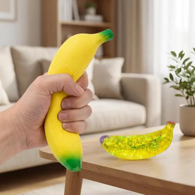 Alt view image 3 of 7 - 2 PCS Banana Squishies, Giant Banana Squishies with Sparkle Glitter, Stress Relief Sensory Tool for Office Desk, Including Jumbo Bananas Stress Ball and Sparkle Bananas Stress Ball, 7'' and 5''